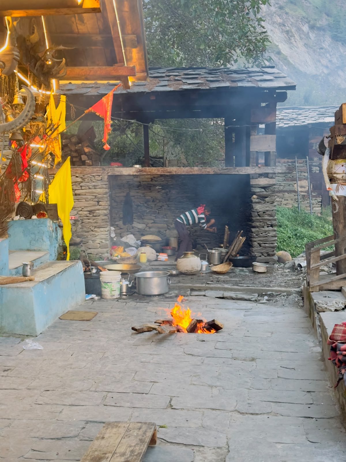 An evening bonfire gathering at Trekkers in Kuarsi